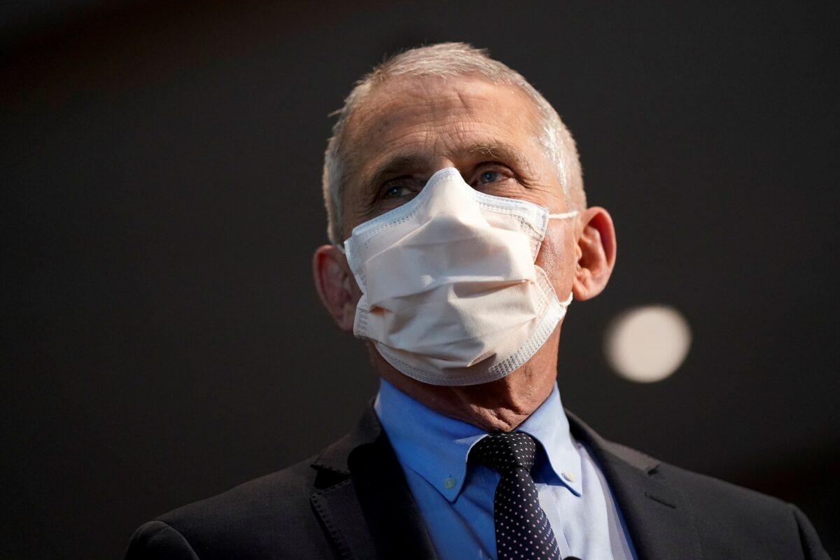 Dr. Anthony Fauci, director of the National Institute of Allergy and Infectious Diseases, before receiving his first dose of the Moderna COVID-19 vaccine at the National Institutes of Health, in Bethesda, Md., on Dec. 22, 2020. (Patrick Semansky/Pool via Reuters)