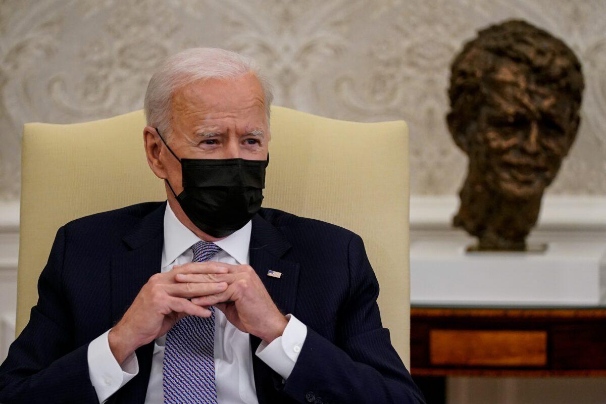 President Joe Biden meets with members of Congress in the Oval Office at the White House in Washington on April 12, 2021. (Amr Afifky/Pool/Getty Images)