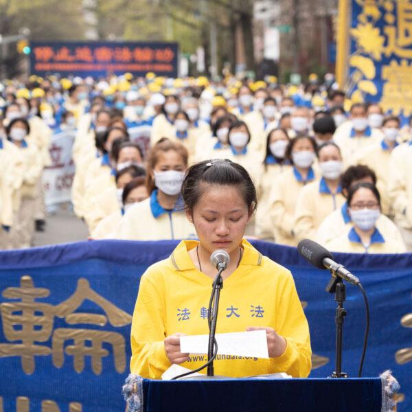 Chen Fayuan, a 16-year-old Erhu player, at a rally in Flushing, New York, on April 18, 2021, to commemorate the 22nd anniversary of the April 25th peaceful appeal of 10,000 Falun Gong practitioners in Beijing. (Larry Dye/The Epoch Times)