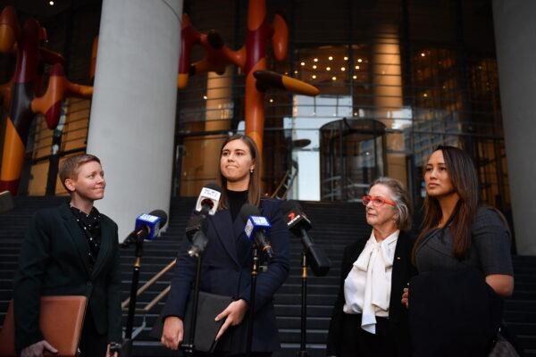 Former political staffer Brittany Higgins speaks to the media as she leaves the Commonwealth Parliamentary Offices after meeting with Prime Minister Scott Morrison in Sydney, Friday, April 30, 2021. (AAP Image/Dean Lewins)