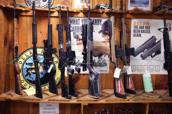 Rifles are offered for sale at Freddie Bear Sports in Tinley Park, Ill., on April 8, 2021. (Scott Olson/Getty Images)