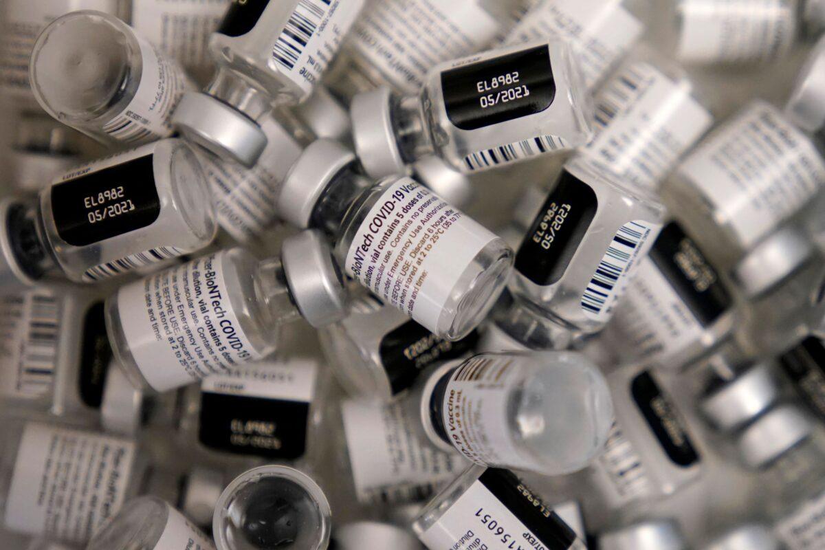 Used vials of the Pfizer-BioNTech COVID-19 vaccine lay empty at a vaccination center at the University of Nevada in Las Vegas, on Jan. 22, 2021. (John Locher/AP Photo)