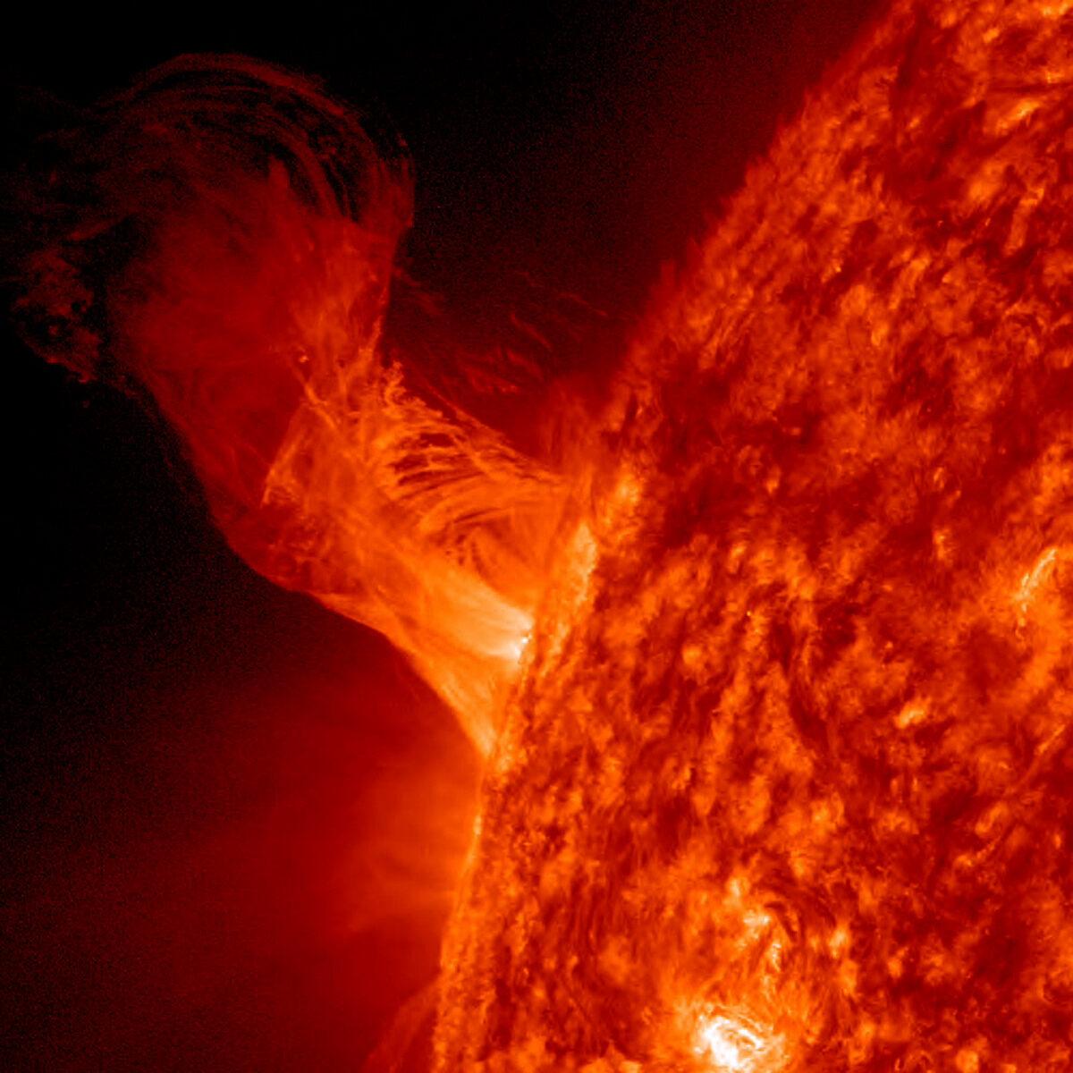 In this handout from NASA, a solar eruption rises above the surface of the sun in space on Dec. 31, 2012. (NASA/SDO via Getty Images)
