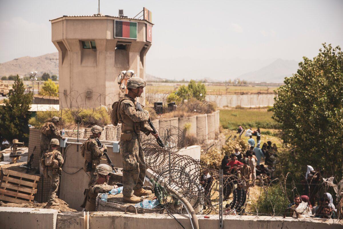 U.S. Marines stand guard at an Evacuee Control Checkpoint at Hamid Karzai International Airport, Kabul, Afghanistan on Aug. 20, 2021. (Sgt. Victor Mancilla/U.S. Marine Corps/Handout via Reuters)