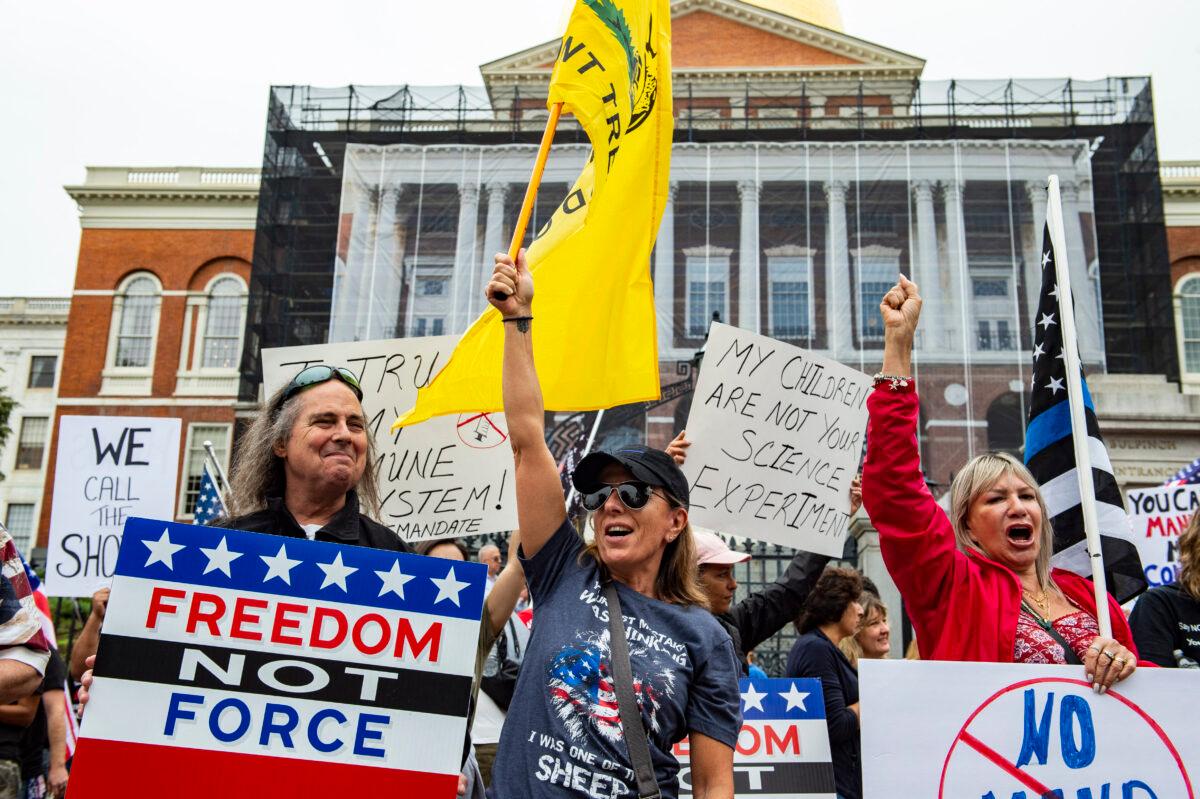 Demonstrators gather outside the Massachusetts State House to protest COVID-19 vaccination and mask mandates in Boston on Sept. 17, 2021. (Joseph Prezioso/AFP via Getty Images)