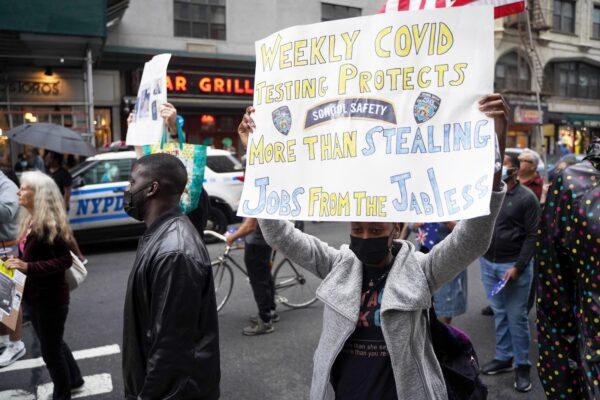 Thousands of US Educators Quit Amid Soaring Numbers of Illegal Immigrant and Special Needs Students | USNN World News Special education teacher Kay Ellis protesting against COVID-19 vaccination mandates in Brooklyn, New York City, on Oct. 4, 2021. (Petr Svab/The Epoch Times)