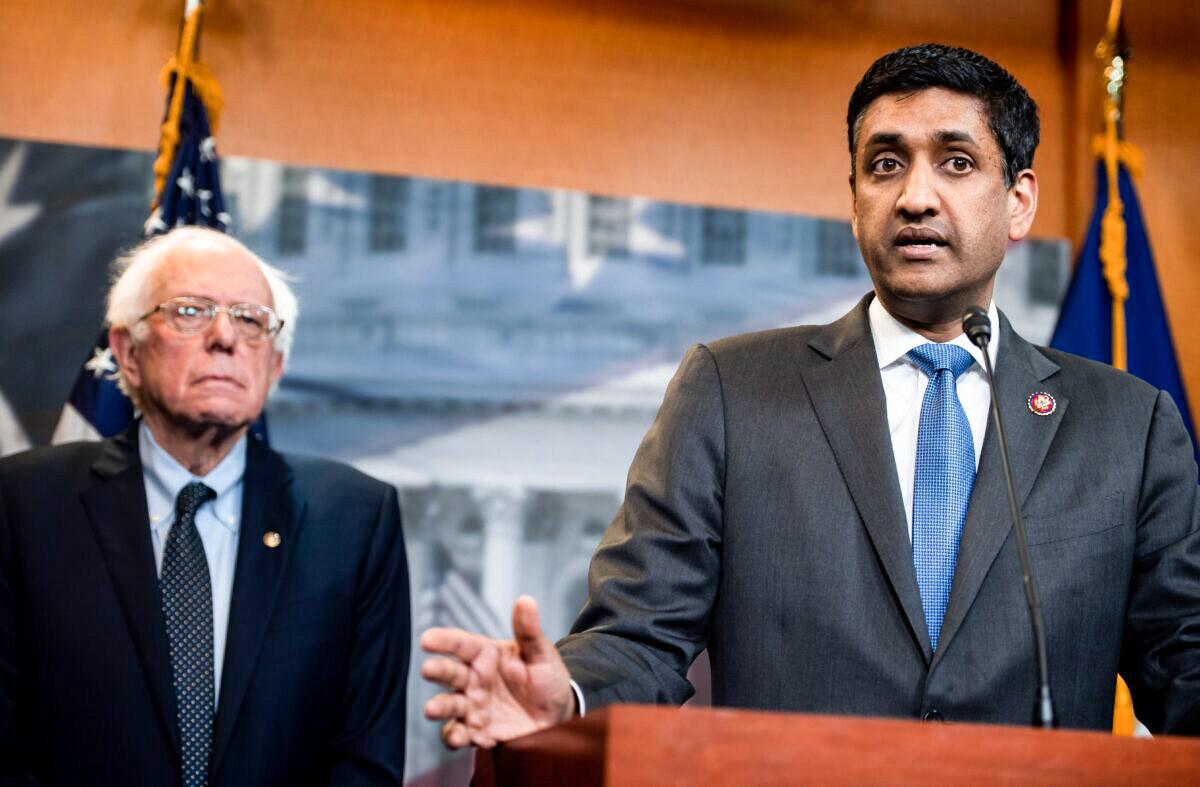 Rep. Ro Khanna (D-Calif.), right, and Sen. Bernie Sanders (I-Vt.) at a news conference in Washington in April 2019. (Saul Loeb/AFP via Getty Images)