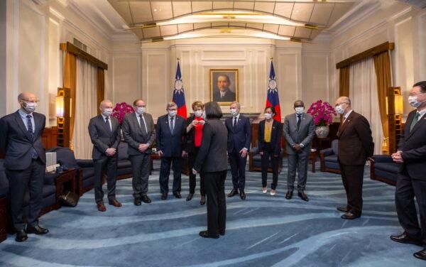 Taiwan President Tsai Ing-wen and members of the France-Taiwan Parliamentary Friendship Group attend a meeting at the Presidential Office in Taipei, Taiwan, on Dec. 16, 2021. (Taiwan Presidential Office/Handout via Reuters)