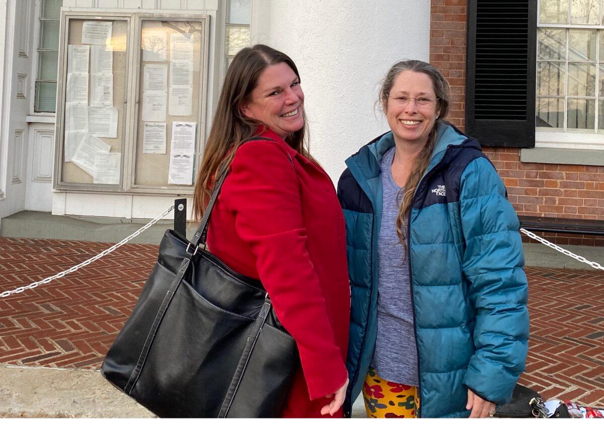 Plaintiff Elizabeth Lancaster (L) and victim’s mother Jessica Smith in front of the Loudoun County District Courthouse in Leesburg, Va., on Jan. 12, 2022. (Terri Wu/The Epoch Times)