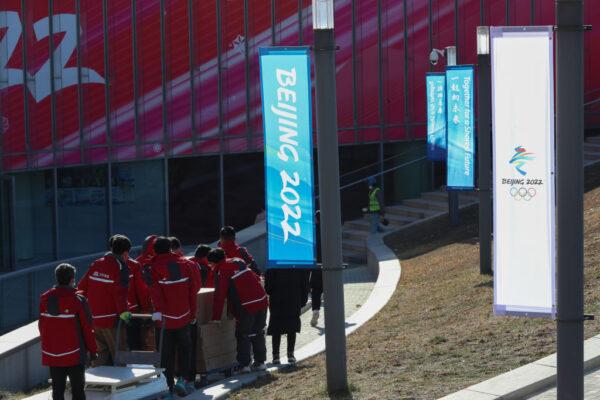 Workers work inside the athletes' village in Beijing, China on Dec. 24, 2021. (Emmanuel Wong/Getty Images)