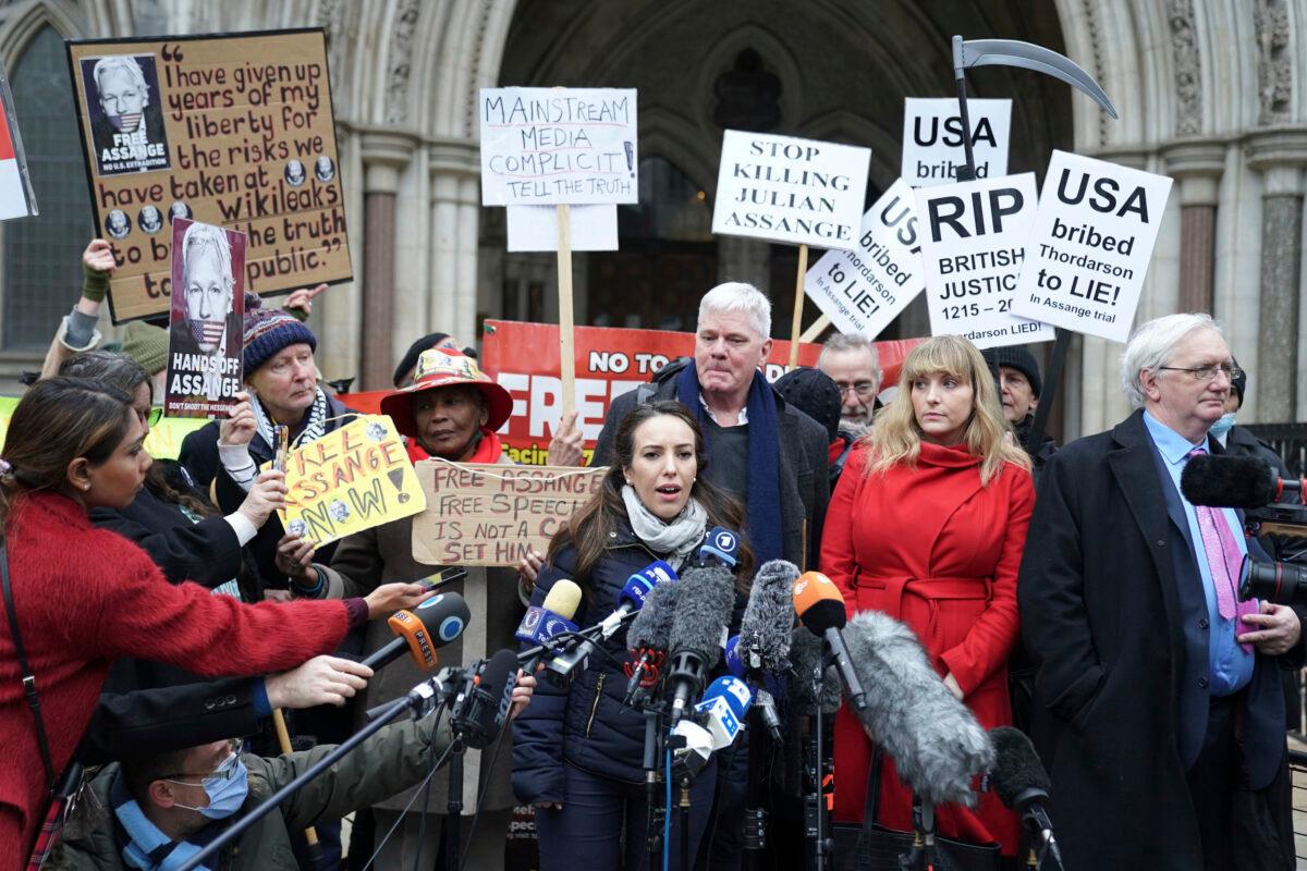 Stella Moris, the partner of Julian Assange, speaks to the media outside the Royal Courts of Justice in London on Jan. 24, 2022. (Kirsty O'Connor/PA via AP)
