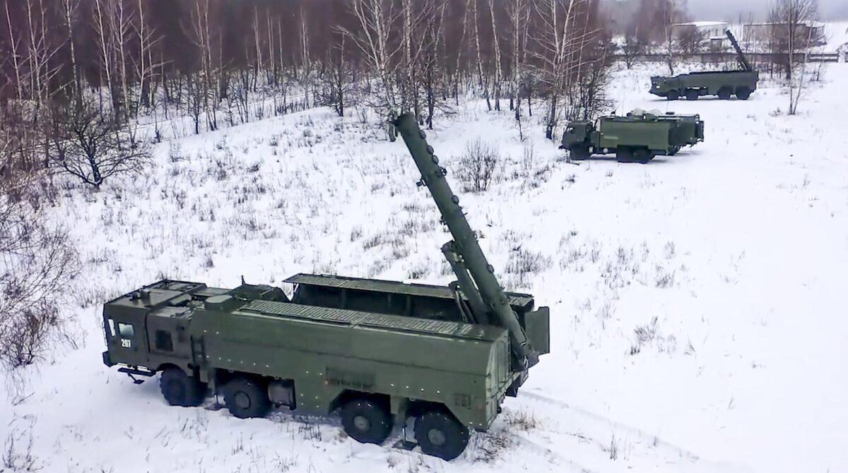 In this photo taken from a video provided by the Russian Defense Ministry Press Service on Jan. 25, 2022, the Russian army's Iskander missile launchers take positions during drills in Russia. (Russian Defense Ministry Press Service via AP)