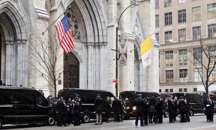 NYPD officers assemble at St. Patrick’s Cathedral in NYC for the funeral of fallen PO Jason Rivera on Jan. 28, 2022. (Dave Paone/The Epoch Times)