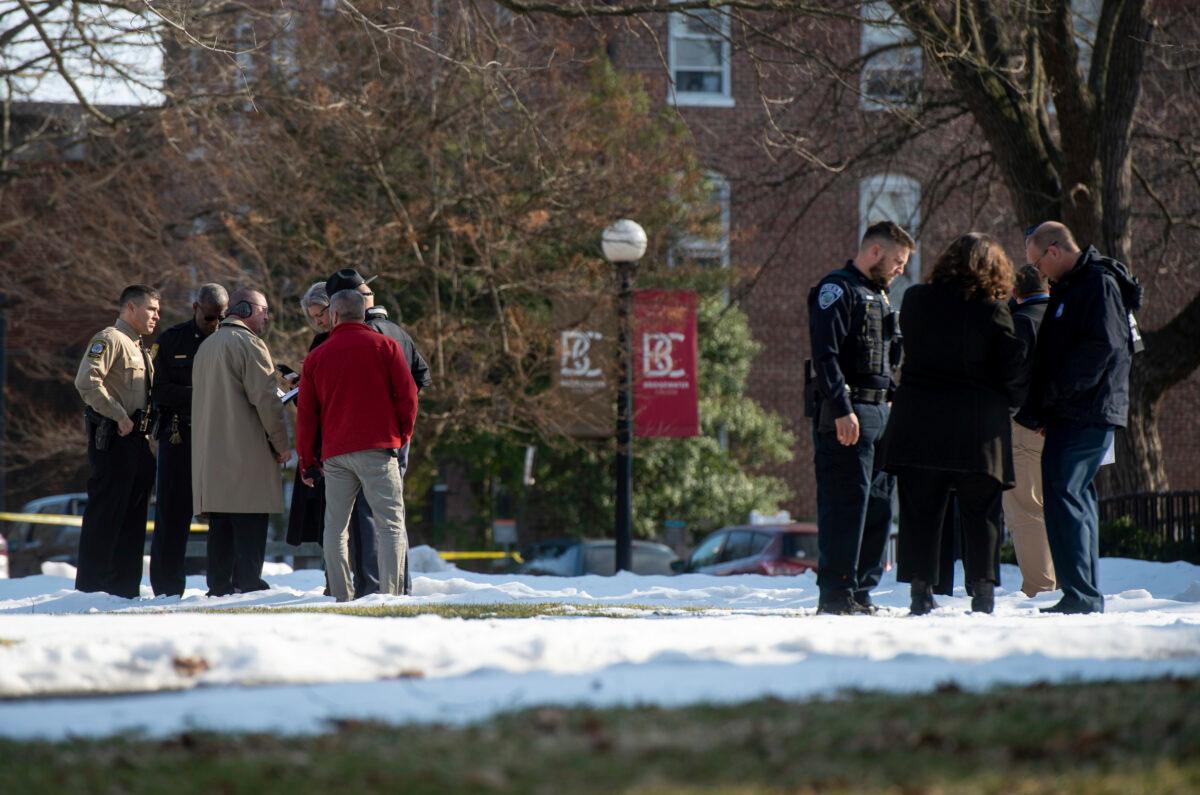 Police investigate the scene of a shooting at Bridgewater College in Bridgewater, Va., on Feb. 1, 2022. (Daniel Lin/Daily News-Record Via AP)