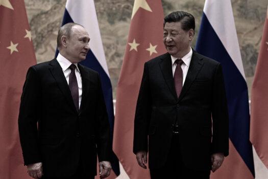 Chinese leader Xi Jinping (R) meets Russian President Vladimir Putin (L) in Beijing on Feb. 4, 2022. (Alexei Druzhinin/Sputnik/AFP via Getty Images)