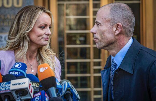 Adult film actress Stormy Daniels, left, stands with her then-lawyer Michael Avenatti during a news conference outside federal court in New York, on April 16, 2018. (Mary Altaffer/AP Photo)