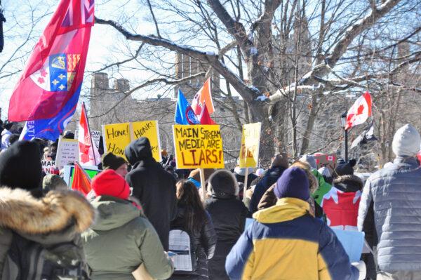Protesters demonstrate against COVID-19 mandates and restrictions on the grounds of the Ontario legislature in Toronto on Feb. 5, 2022. (Allen Zhang/The Epoch Times)