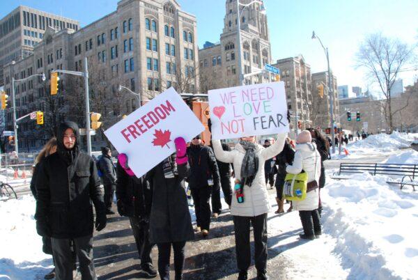 Protesters demonstrate against COVID-19 mandates and restrictions on the grounds of the Ontario legislature in Toronto on Feb. 5, 2022. (Yi Ling/The Epoch Times)