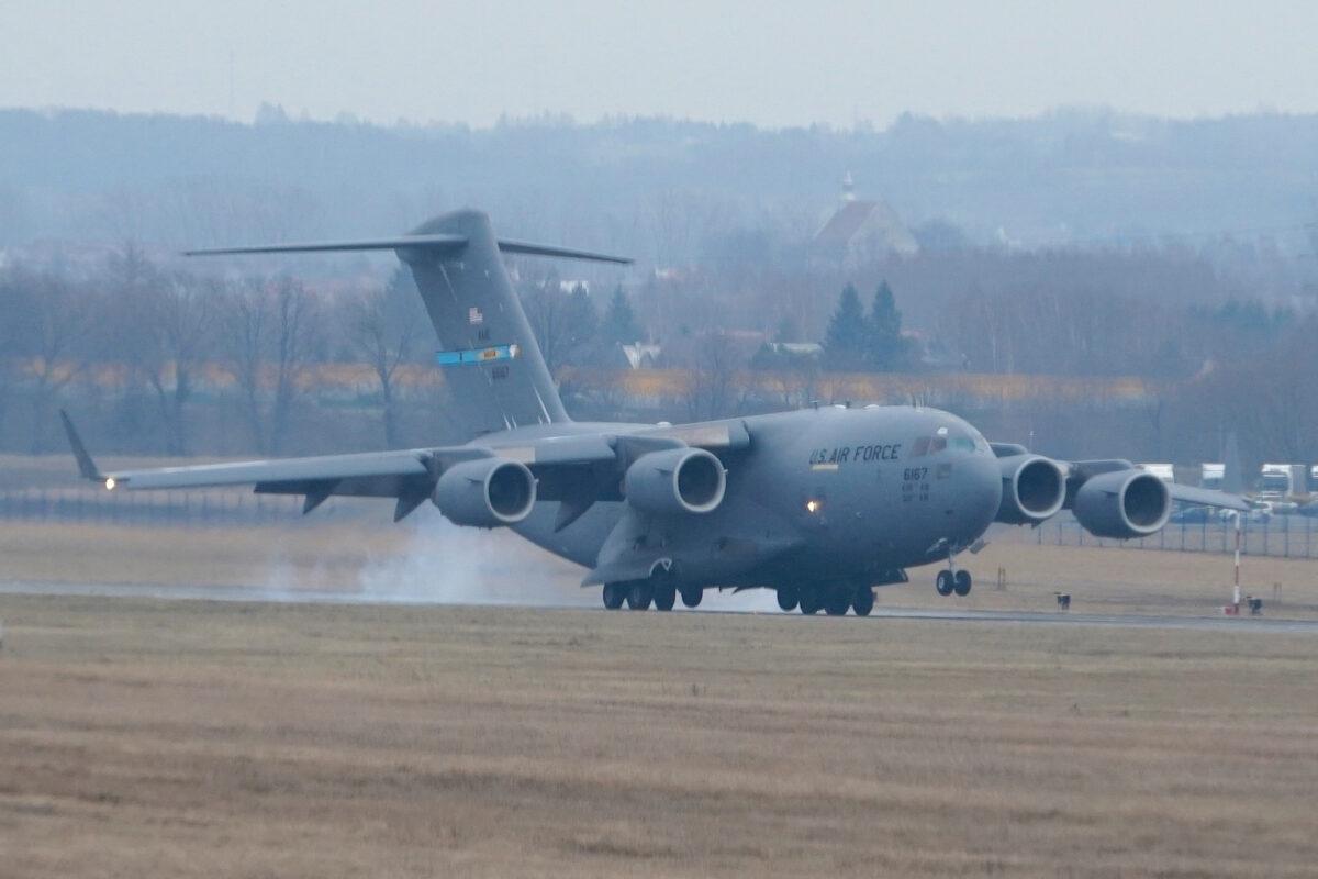 A U.S. Air Force transport plane transporting military equipment and troops lands at the Rzeszow-Jasionka airport in southeastern Poland, on Feb. 6, 2022. Tensions between the NATO military alliance and Russia are intensifying due to Russia's move of tens of thousands of troops as well as heavy weapons to the Ukrainian border. (Janek Skarzynski/AFP via Getty Images)