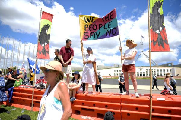Protesters against vaccine mandates gather on the lawn of Parliament House in Canberra, Australia, on Feb. 12, 2022. (Tracey Nearmy/Getty Images)