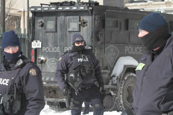 A police officer in Ottawa on Feb. 18, 2022. (Richard Moore/The Epoch Times)