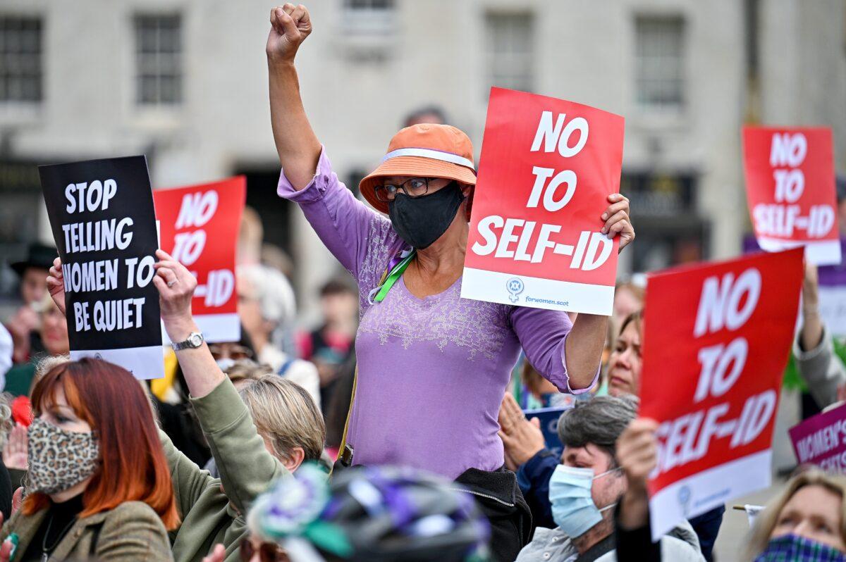 Members of the public take part in a woman’s rights demo against the Scottish government’s decision to allow self-declaration of sex in the 2022 census, in Edinburgh, Scotland, on Sept. 2, 2021. (Jeff J Mitchell/Getty Images)
