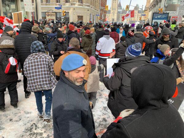 Protesters against COVID-19 mandates gather in downtown Ottawa on Feb. 19, 2022. (Jonathan Ren/The Epoch Times)