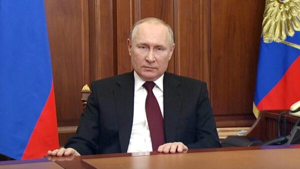 Russian President Vladimir Putin addresses the nation at the Kremlin in Moscow on Feb. 21, 2022, in a still from a video. (Russian Pool via Reuters/Screenshot via The Epoch Times)