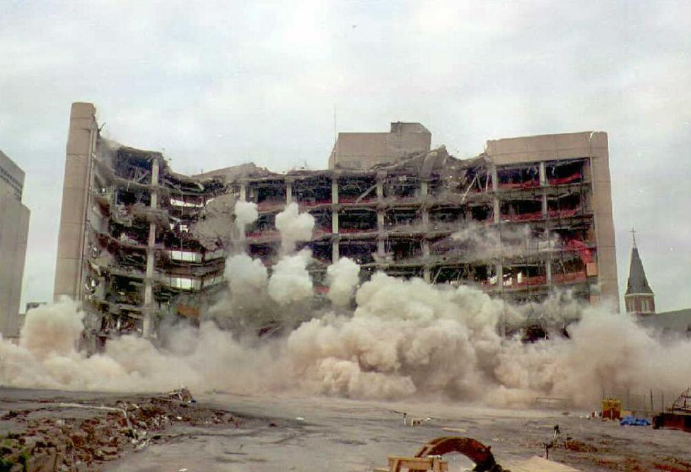 The Alfred P. Murrah Federal Building in the first seconds of its five-second-implosion in Oklahoma City on April 19, 1995. (POOL PHOTO/AFP via Getty Images)