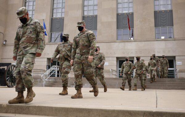 National Guard troops leave Washington after being stationed there for four months following the Jan. 6, 2021, breach of the U.S. Capitol, on May 24, 2021. (Kevin Dietsch/Getty Images)