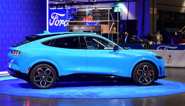 The all-electric Ford Mustang Mach-E GT SUV is displayed at the Los Angeles Auto Show in Los Angeles, California on Nov. 18, 2021. (Frederic J. Brown/AFP via Getty Images)