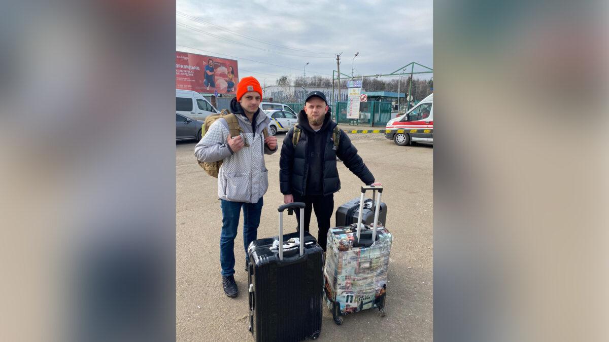 Vasyk Didyk (left) and Igor Shehyni (right) arrive in Ukraine on Wednesday after more than 24 hours of travel from New York. (Courtesy of AnneClaire Stapleton/CNN)