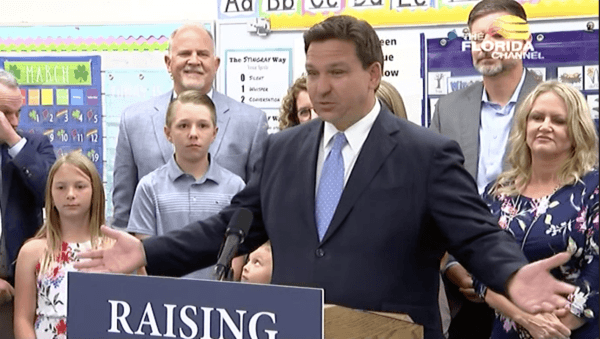 Florida Gov. Ron DeSantis announces $800 million will be set aside for teacher pay raises in his state this year during a press conference at Fleming Island Elementary, on March 21, 2022. (The Florida Channel)