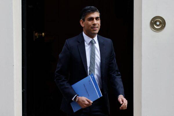 Britain's Chancellor of the Exchequer Rishi Sunak leaves 11 Downing Street to announce budget updates in the House of Commons in London on March 23, 2022. (Tolga Akmen /AFP via Getty Images)