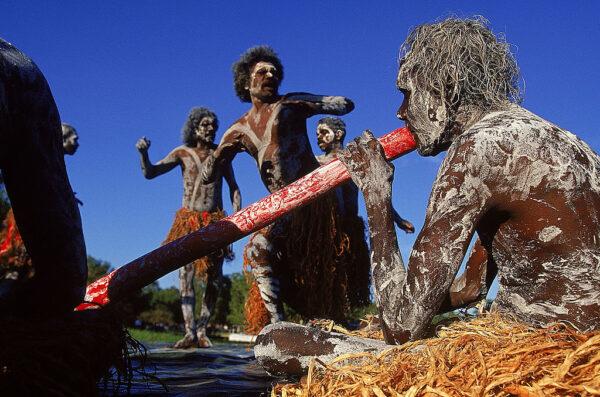 Aboriginal dancers perform during the 2000 Sydney Olympic Torch Relay at Yellow Water in Kakadu National Park, Northern Territory, Australia, on June 29, 2000. (Adam Pretty/Allsport)