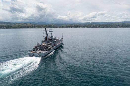 In this handout provided by the Australian Department of Defence, Armadale Class Patrol Boat, HMAS Armidale, sails into the Port of Honiara, Guadalcanal Island, Solomon Islands, on Dec. 1, 2021. (CPL Brodie Cross/Australian Department of Defence via Getty Images)