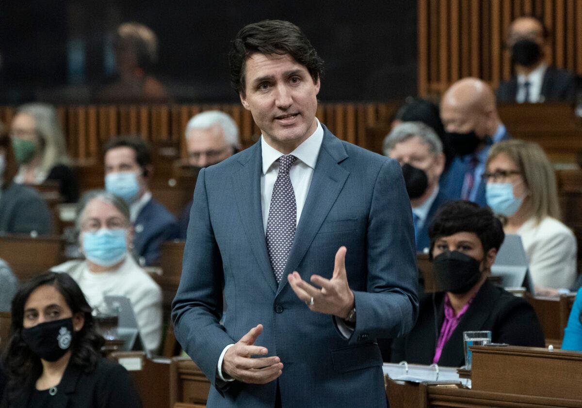 Prime Minister Justin Trudeau rises during question period in Parliament on March 22, 2022. (Adrian Wyld/The Canadian Press)