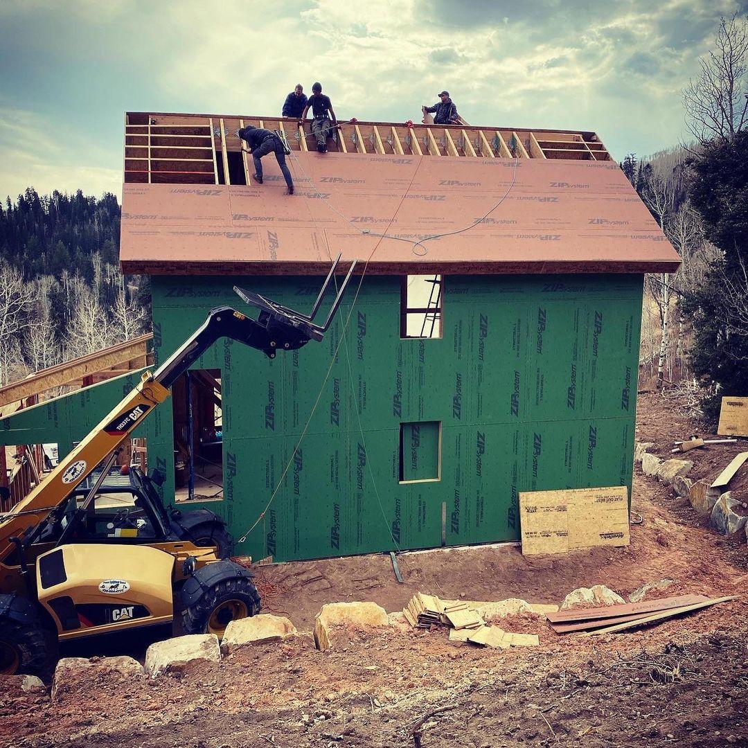 The construction of Trent and Allie's dream cabin in the mountains. (Courtesy ofTrent and Allie)