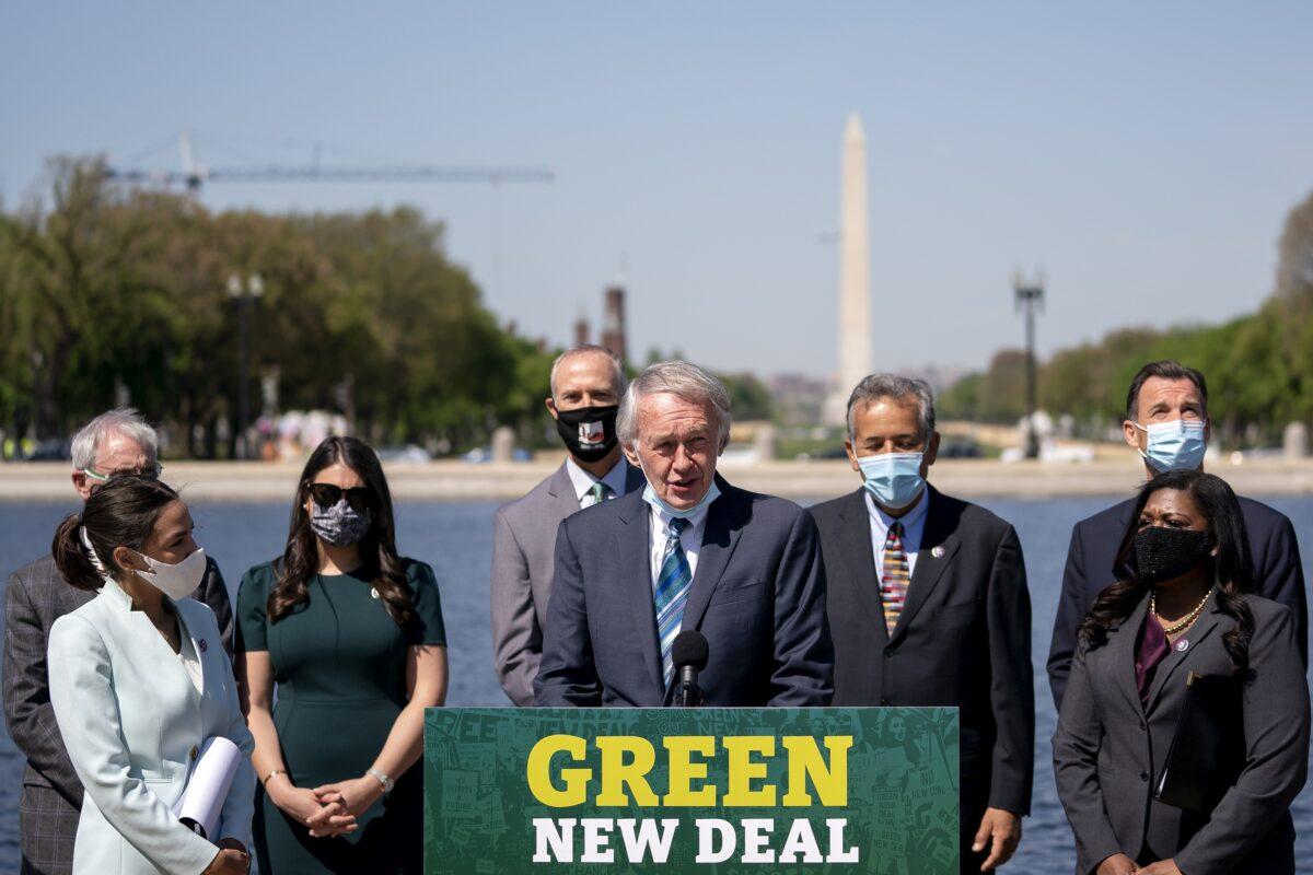 Lawmakers reintroduced the Green New Deal and introduced the Civilian Climate Corps Act. Massachusetts Sen. Edward Markey (C), a Democrat, speaks during a press conference on Capitol Hill on April 20, 2021.  (Stefani Reynolds/Bloomberg via Getty Images)