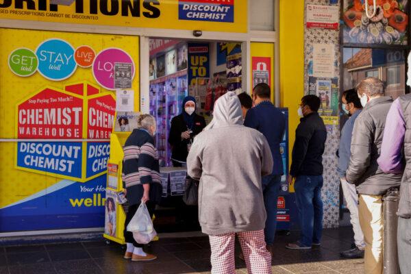 People queue at a chemist in Lakemba in Sydney, Australia, on July 22, 2021. (Jenny Evans/Getty Images)