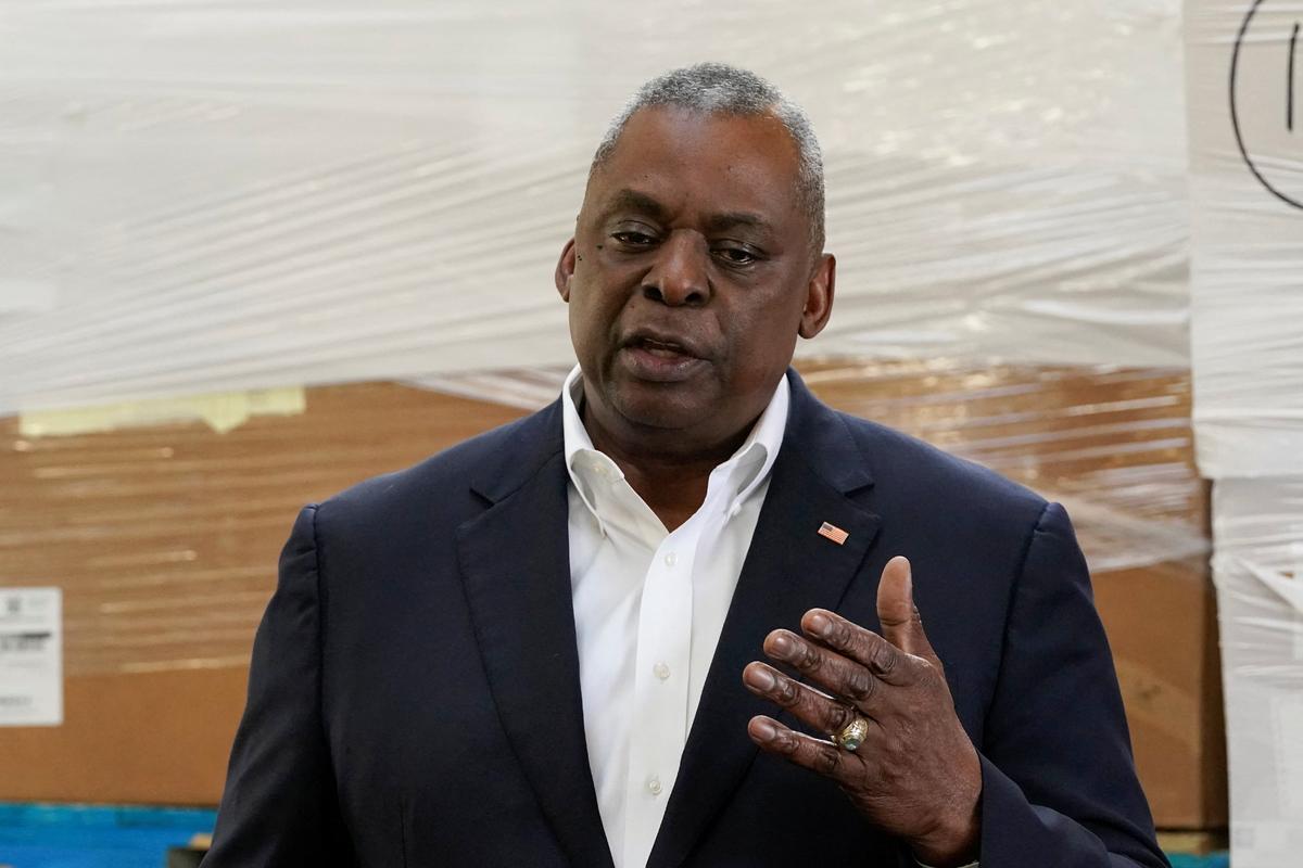 U.S. Secretary of Defense Lloyd Austin speaks with reporters after returning from their trip to Kyiv and meeting with Ukrainian President Volodymyr Zelenskyy, near the Ukraine border, in Poland, on April 25, 2022. (Alex Brandon/Pool via Reuters)