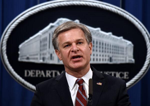 FBI Director Christopher Wray during a press conference at the Department of Justice in Washington on Sept. 22, 2020. (OLIVIER DOULIERY/POOL/AFP via Getty Images)