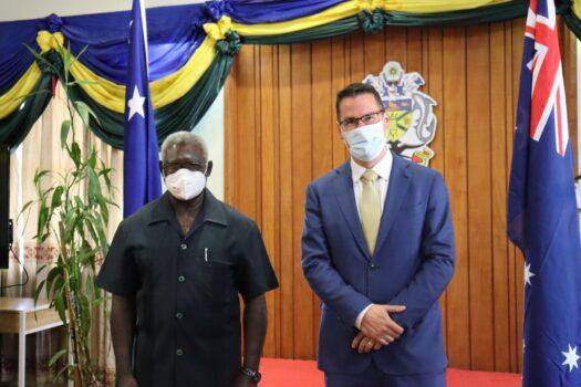 Solomon Islands Prime Minister Manasseh Sogavare (L) with Australian Pacific Minister Zed Seselja (R) in Honiara, Solomon Islands, on April 14, 2022. (Supplied/Australian Department of Foreign Affairs and Trade)