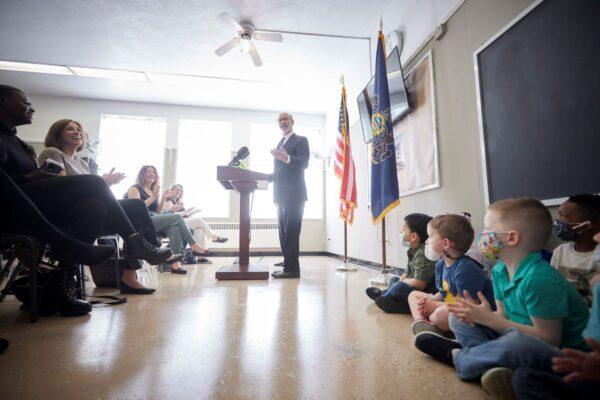 As masked children look on, Pennsylvania Gov. Tom Wolf speaks with the press at the Pocono Family YMCA about his proposal to give households earning $80,000 or less a one-time payment of $2,000 through American Rescue Plan Act funds on April 14, 2022. (Commonwealth Media Service)
