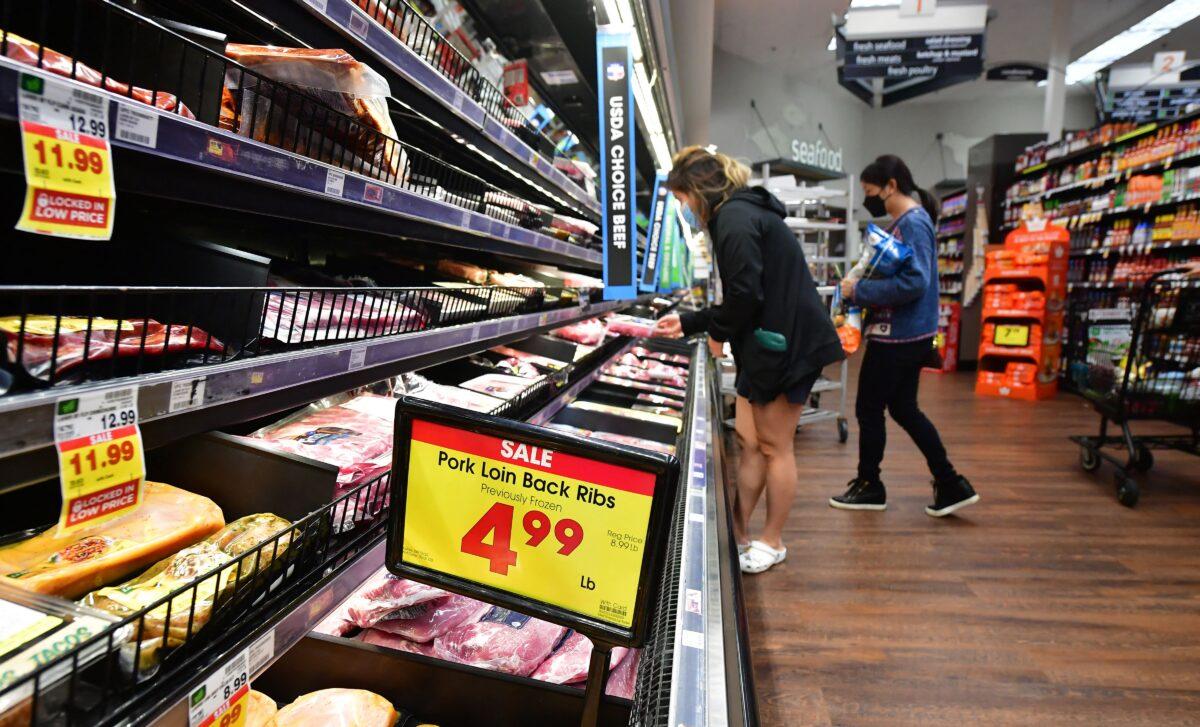 People shop at a grocery store in Monterey Park, California, on April 12, 2022. (Frederic J. Brown/AFP via Getty Images)