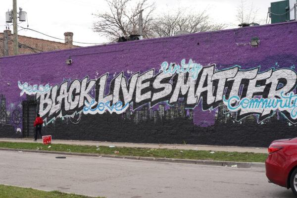 A Black Lives Matter mural next to Hugo Limon's block in the West Humboldt Park neighborhood on the West Side of Chicago on April 11, 2022. (Cara Ding/The Epoch Times)