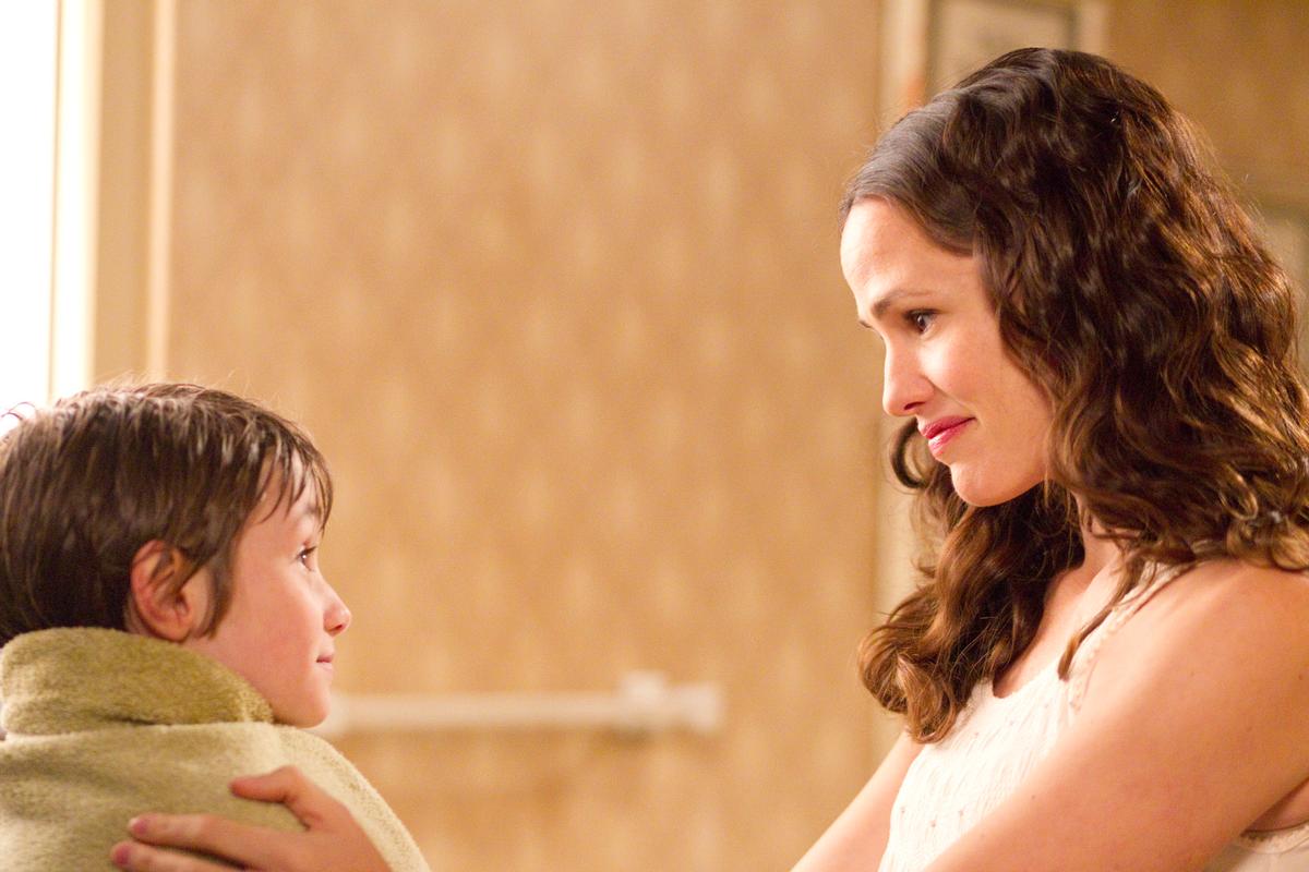 Timothy Green (CJ Adams) and Cindy Green (Jennifer Garner), in "The Odd Life of Timothy Green," a film about a childless couple who grow themselves a son. (Walt Disney Studios Motion Pictures)