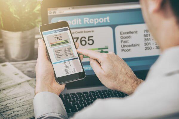 Your credit score determines your ability to obtain credit and potentially be approved for loans. (REDPIXEL.PL/ShutterStock)