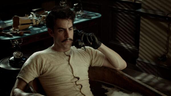 Inspector Dasté (Sacha Baron Cohen) in a moment when he is not policing the train station. (Paramount Pictures)