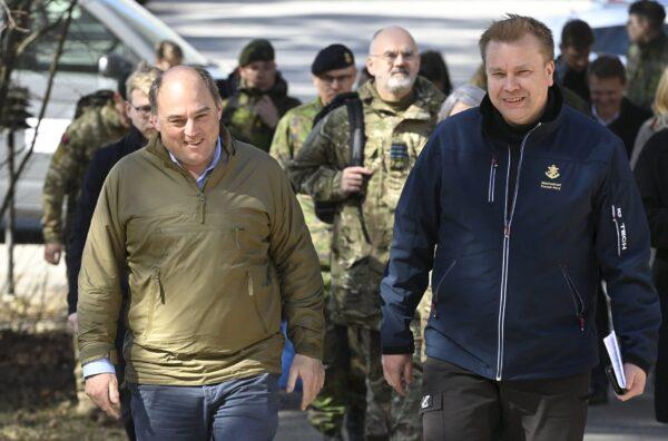 Finland's Minister of Defence Antti Kaikkonen (R) and Britain's Defence Secretary Ben Wallace arrive for a press conference of the exercise Arrow 22 at the Niinisalo garrison in Kankaanpaeae, Finland, on May 4, 2022. (Heikki Saukkomaa /Lehtikuva/AFP via Getty Images)